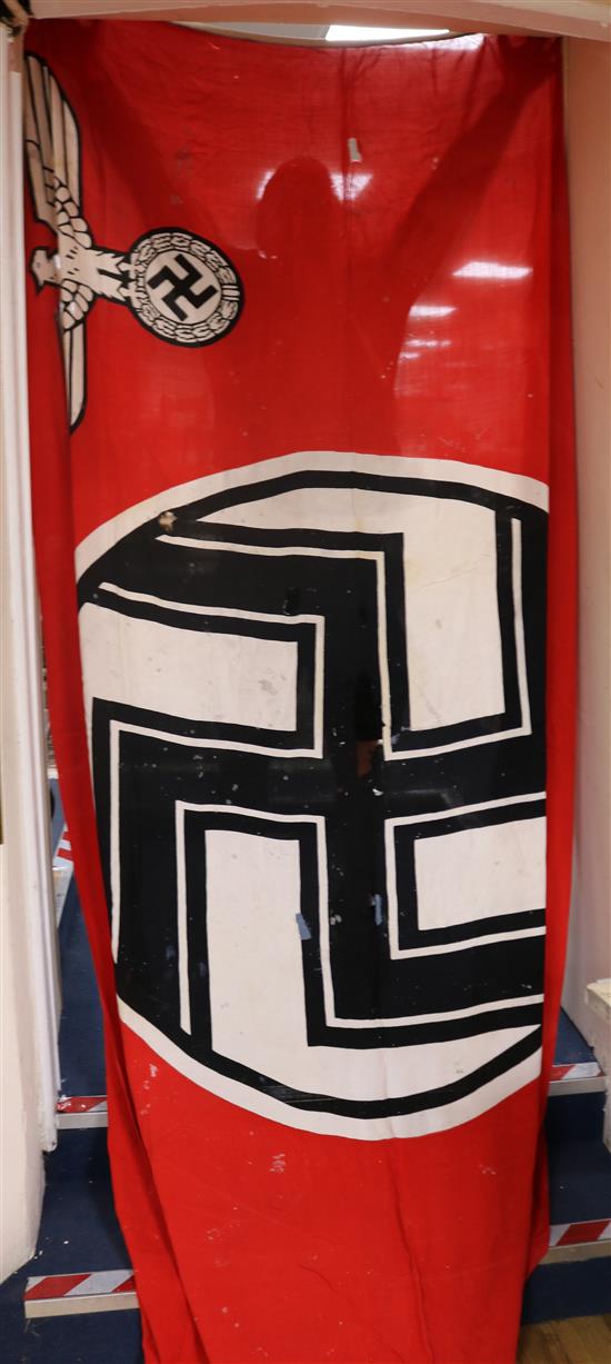 A German WWII large barracks battle flag (with makers name, some damage)